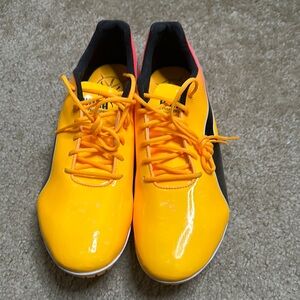Puma Bright Yellow, Black, and pink Sprint Spikes